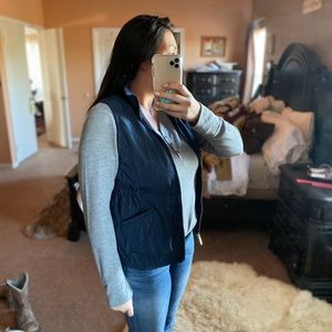 Navy blue quilted vest